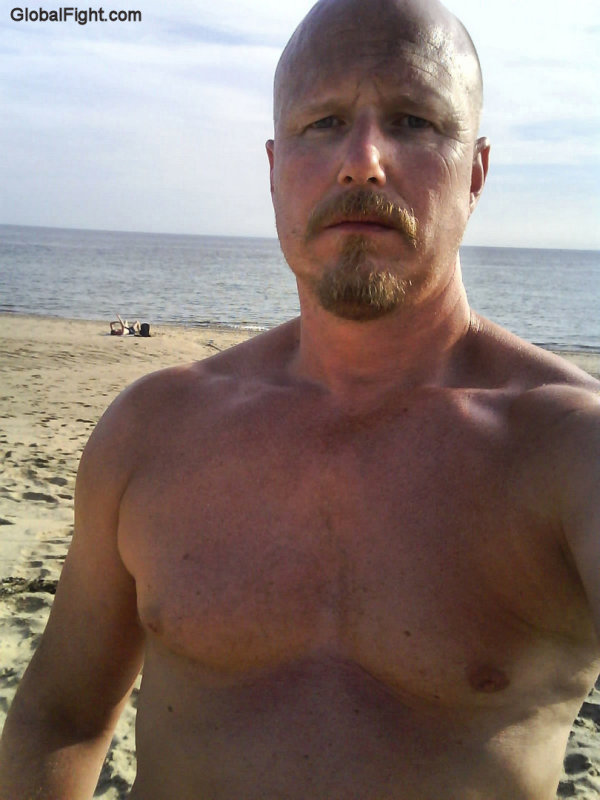 hot older man beach ocean.jpg