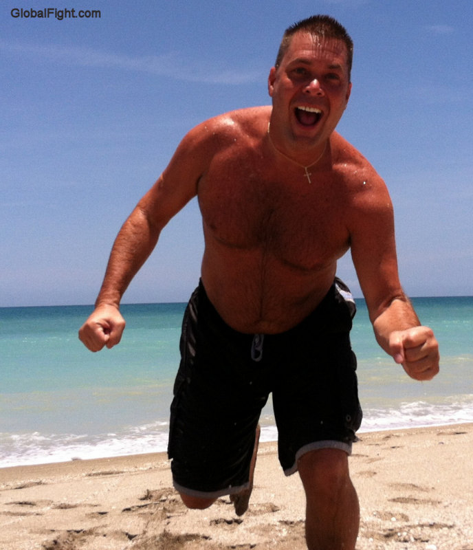 hairy guy wet swimming beach.jpg