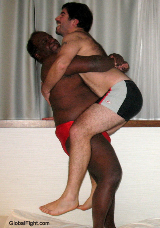 black daddy bearhugging slave boy.jpg