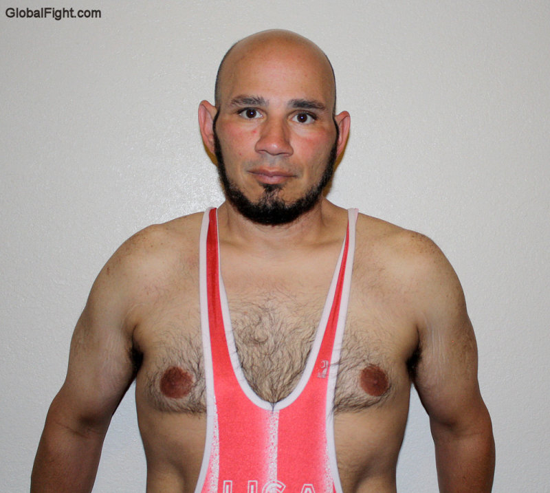 big pecs man wearing singlet.jpg