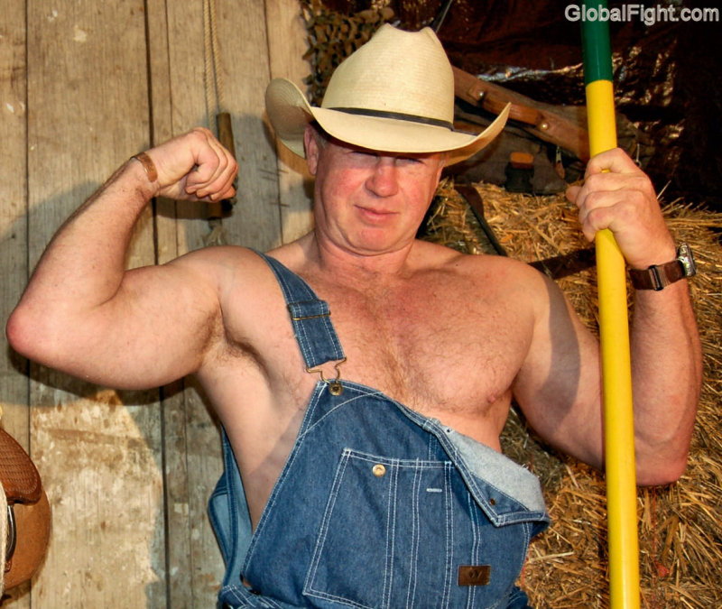 cowboy daddie flexing biceps.jpg
