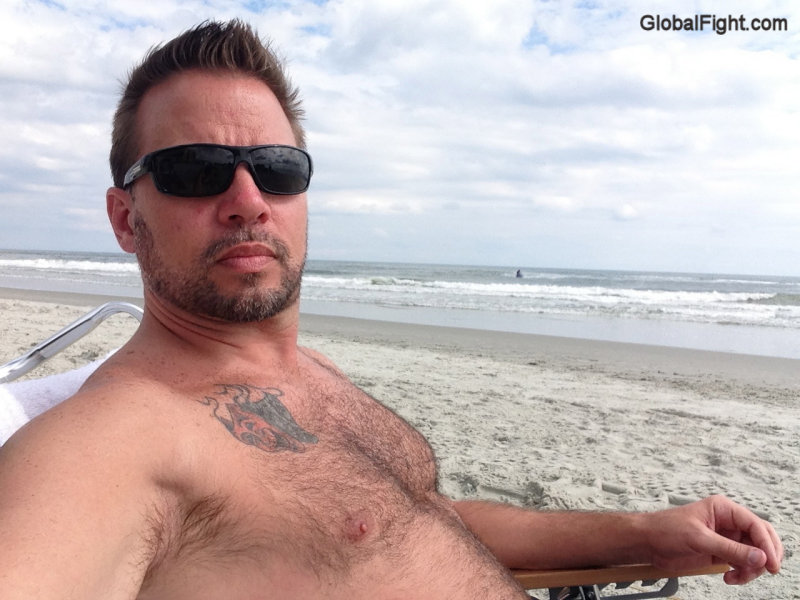 sweaty man beach hunks.jpg