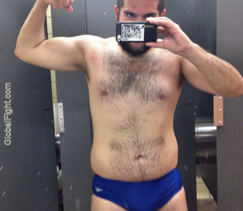 man flexing gym shower mirror.jpg