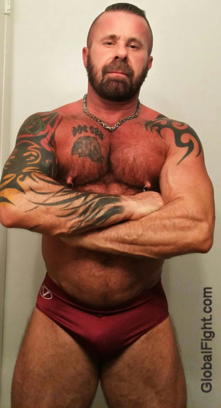 gay tatted up musclehunk.jpg