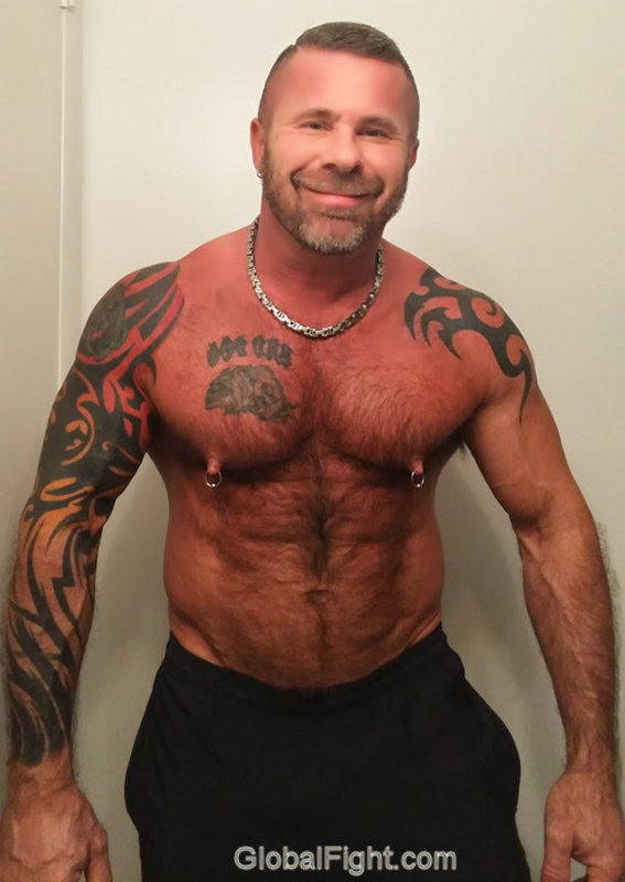 muscleman tattooed beefy chest.jpg