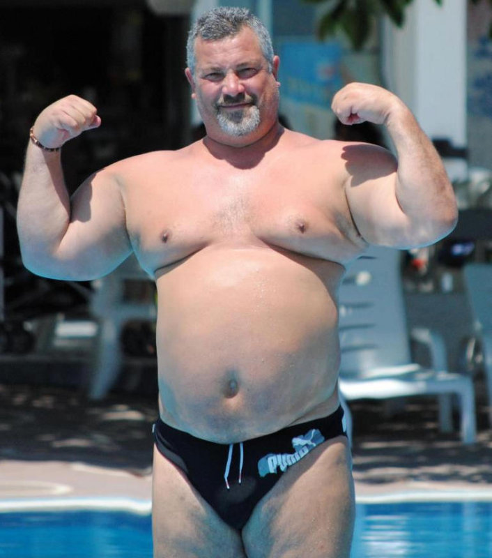 big beefy pool man flexing.jpg