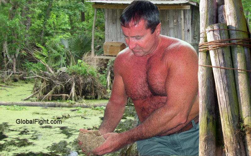 man working swamp shirtless.jpg