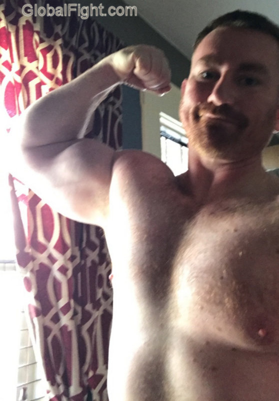 bearded muscleman flexing.jpg
