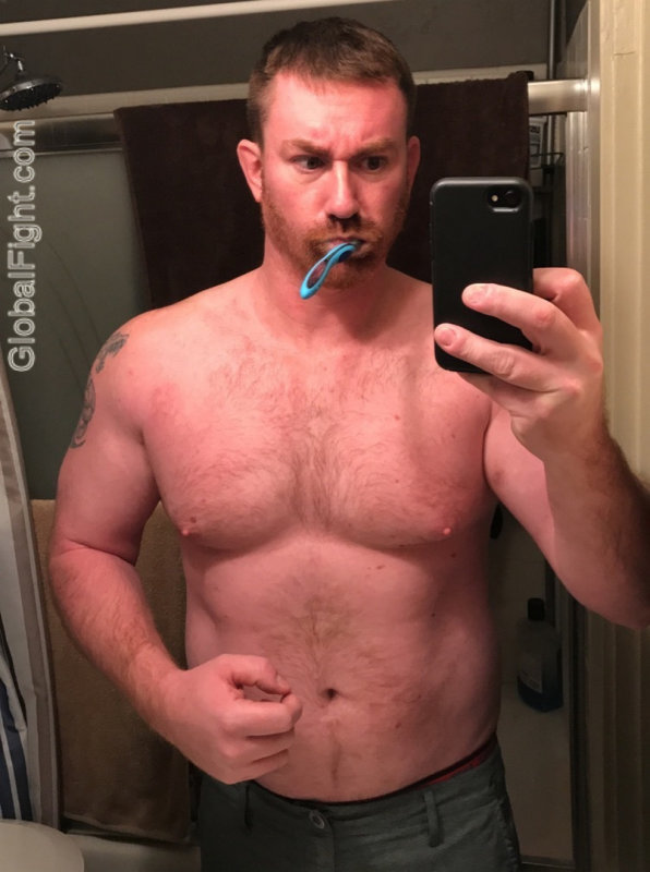 brushing his teeth bathroom.jpg