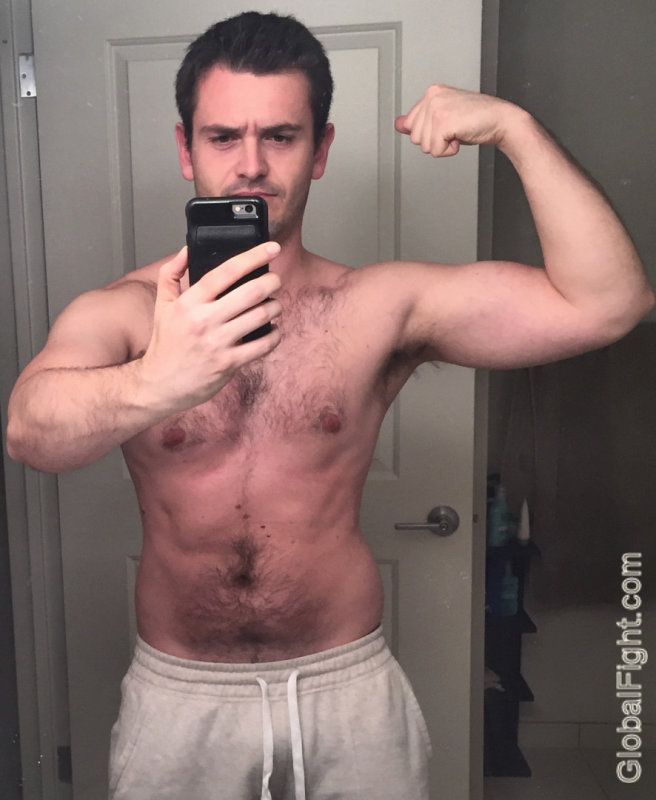 gay studs flexing.jpg