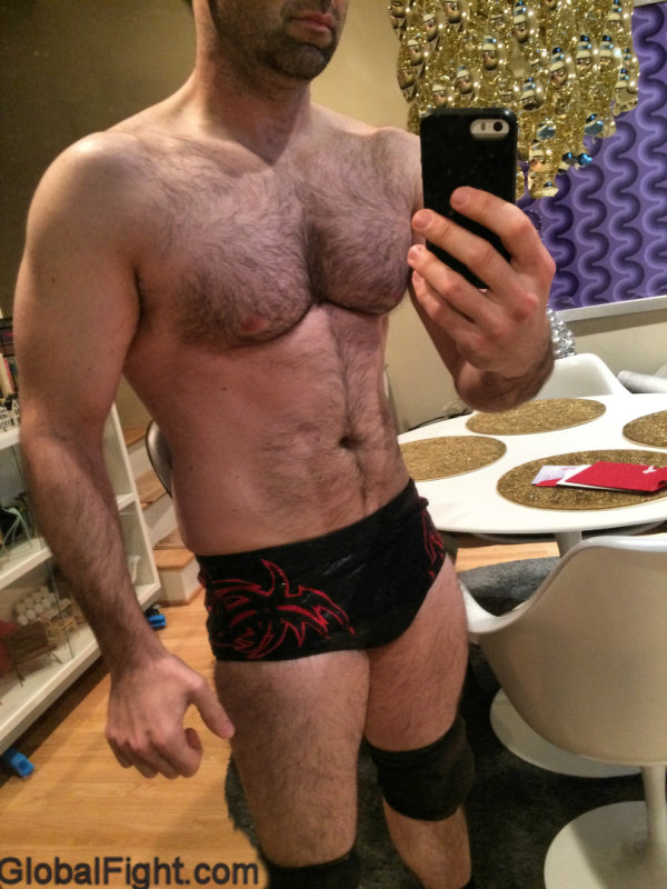 hairy bodybuilder flexing.jpg