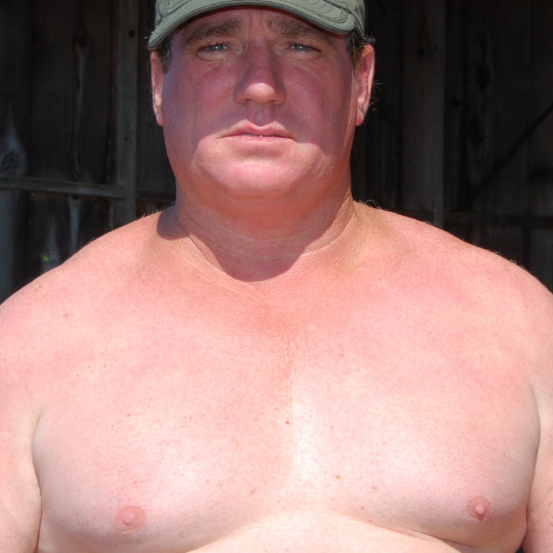 powerlifter big pecs man.jpg