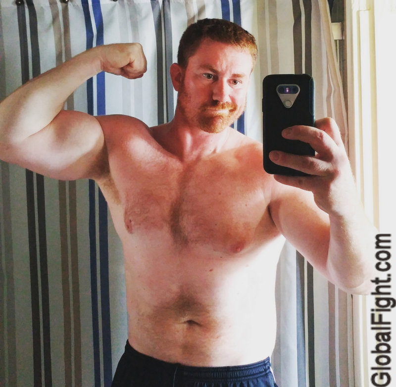 redhead redbeard man flexing.jpg