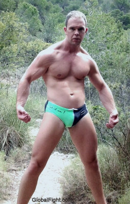 bodybuilder standing desert flexed arms.jpg