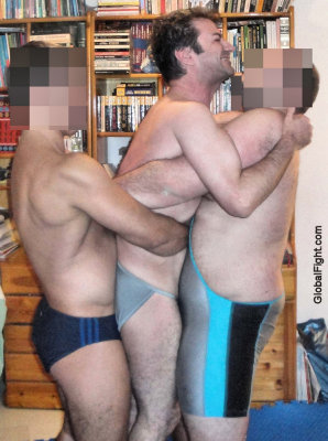 3 gay guys erotic home wrestling match.jpg