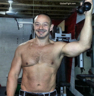 musclebound gay man home gym.jpg