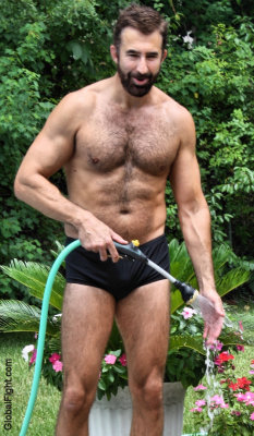 very hot handsome man cleaning pool.jpg