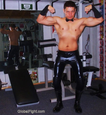 gay leather man flexing muscles.jpg