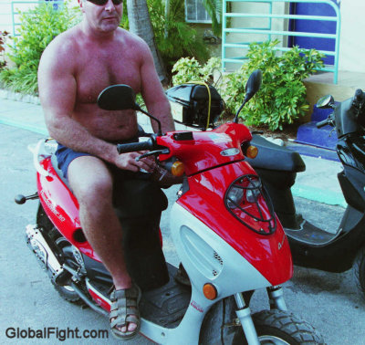 hot daddy riding moped.jpg