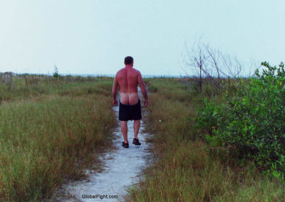 man walking beach nude.jpg