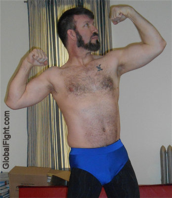 amateur wrestler flexing arms.jpg