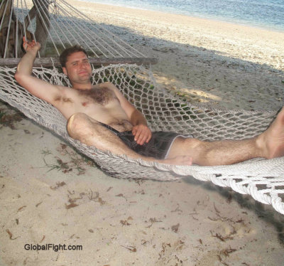 man relaxing beach hammock.jpg