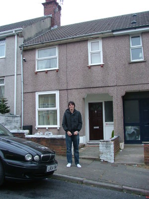 Hayden outside his parents' Swansea home