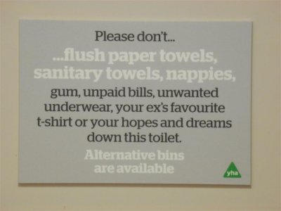 Sign in the ladies toilet cubicles