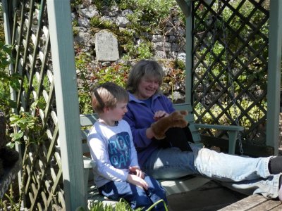 Grandma entertains with Bobby bat