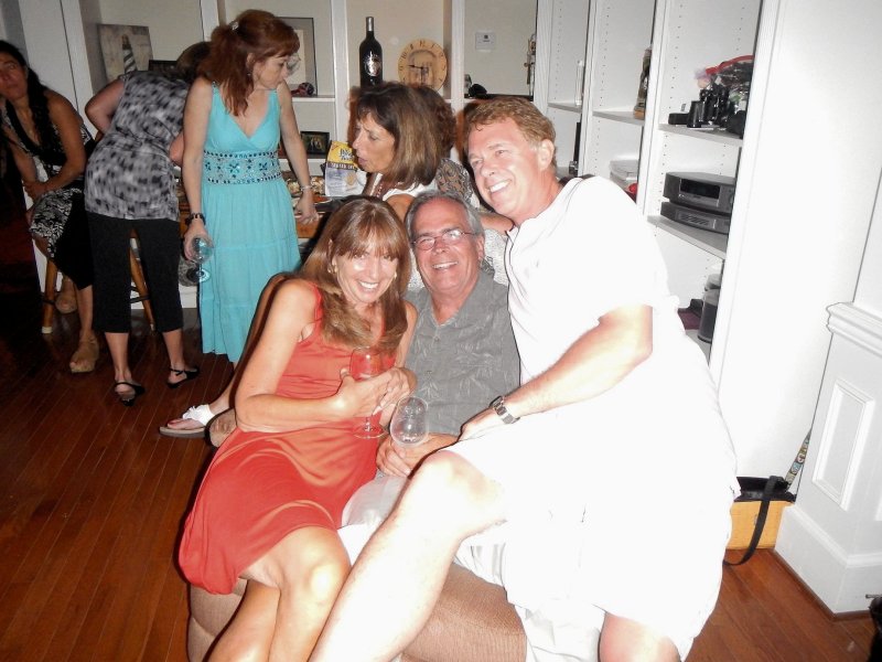 Ron is smothered by love.