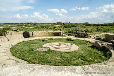the circular gun pits, which housed the 155mm guns