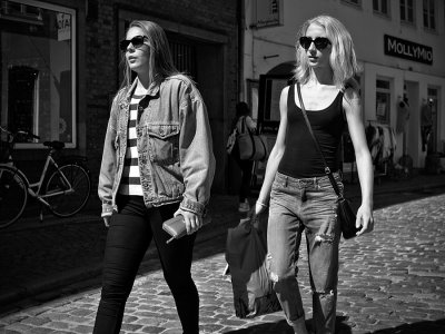Friends in sunny street