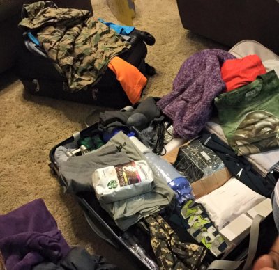 Grace and Delfin packing for trip to Philippines