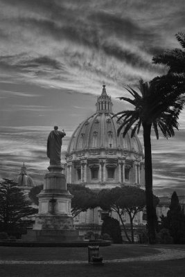 St. Peter looks at the dome of the basilica from the Vatican garden