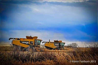 Lexion and Claas trying to beat the rain. (1 of 1).jpg