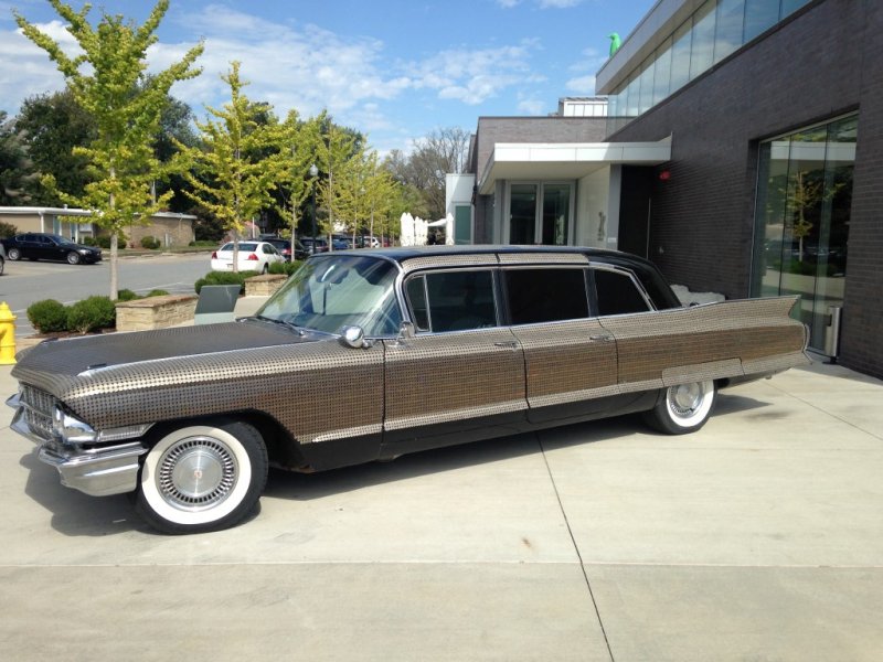 Cadillac, covered with coins