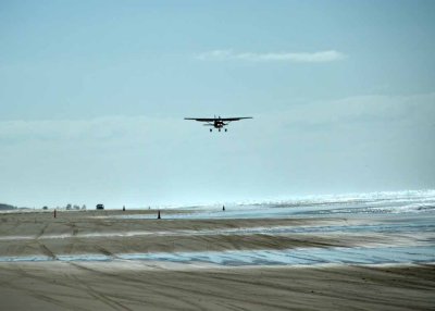 Plane cars beach Fraser Island East Coast.jpg