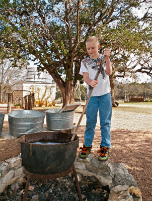 Picture story #2: Boy learning to wash the old-fashioned way