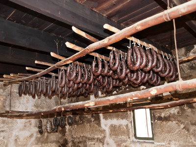 Smoked sausage inside smokehouse