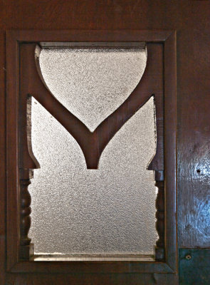 Abstract M on mens room door