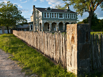 House with cedar-stay fence