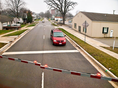 Railroad crossing, watch for the cars. Can you spell that without any r's?