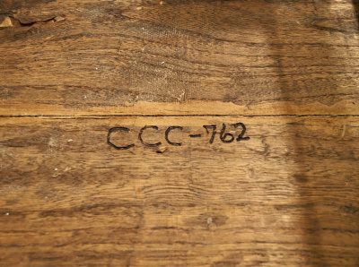 CCC stamp on dinning room chairs.