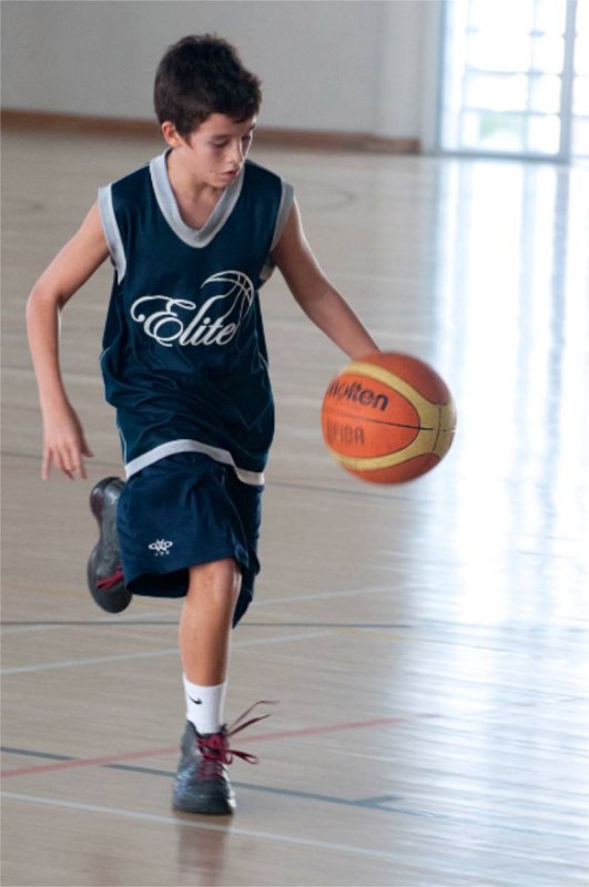 Star basketballer, Lachlan. at holiday training session.