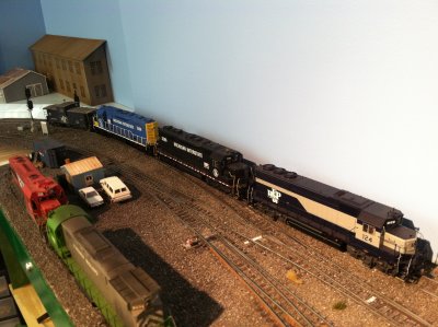 The RF&P GP40 eases them into the yard.  these SD35's will be built in SD22ECO's.