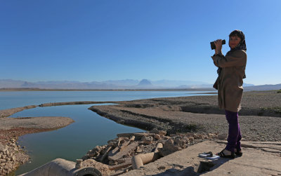 Tanya looking for birds on the Aras Dam, Iran