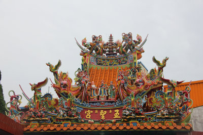 Details of the elaborate decorations on the temple's roof.
