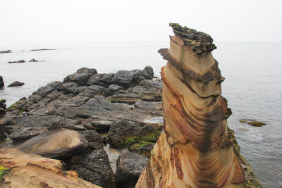 Natural Nanya rock formations, resembling a bamboo shoot and a fish.