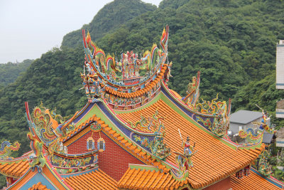 Close-up of the Buddhist carvings and decorations on the temple.