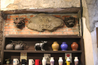 Note the two Chinese dragon masks on the wall.